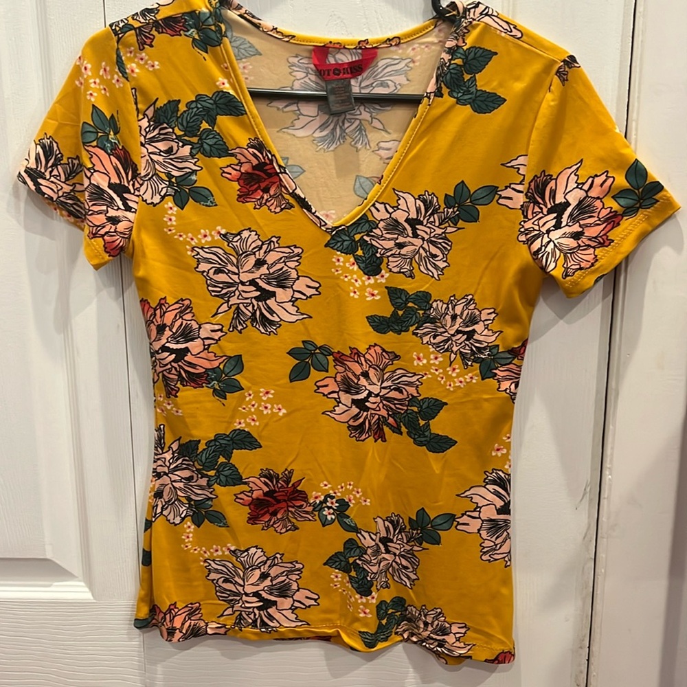 Women’s Hot Kiss shirt. Orange with flowers